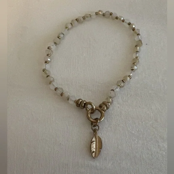 Beaded Bracelet with Feather Charm in Gold - Picture 2 of 2